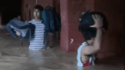 Watch: Jammu college students wade through knee-deep water, carry bags on head; heavy rains batter J&K
