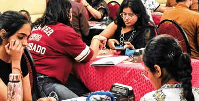 Players across all ages at a Scrabble tournament in Delhi Gyttja, Caziques, Mbaqanga Scrabble’s now a competitive sport