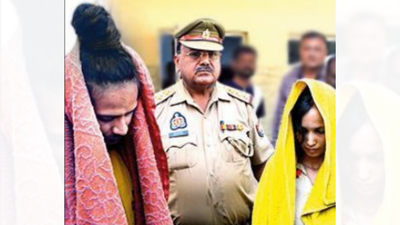 Muskan (R) and Sahil allegedly killed the former’s husband and hid his dismembered remains in a blue drum at his Meerut house Facing boycott, family of 'blue drum' murder accused to leave home