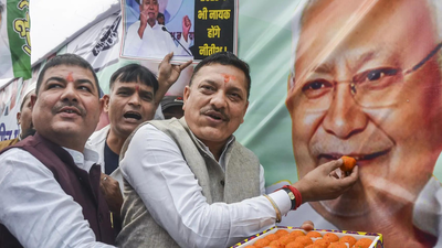 Workers celebrating as NDA crosses 200 mark (PTI image) From litti chokha to jalebis: Streets burst into celebration as NDA crosses 200 mark; Delhi BJP HQ readies Bihari feast for victory night