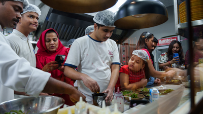 ‘Serving love on a plate’: Children on the spectrum take over the kitchen at India Autism Center’s Children’s Day event