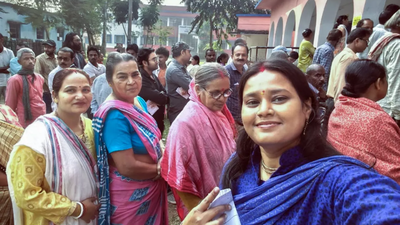 A voter clicks a selfie at a polling station during the second phase of the Bihar assembly elections, in Kishanganj on Nov 11. (Pic credit: ANI) Bihar's Kishanganj election result 2025: Sweety Singh takes strong lead as Qamrul Hoda trails in early trends